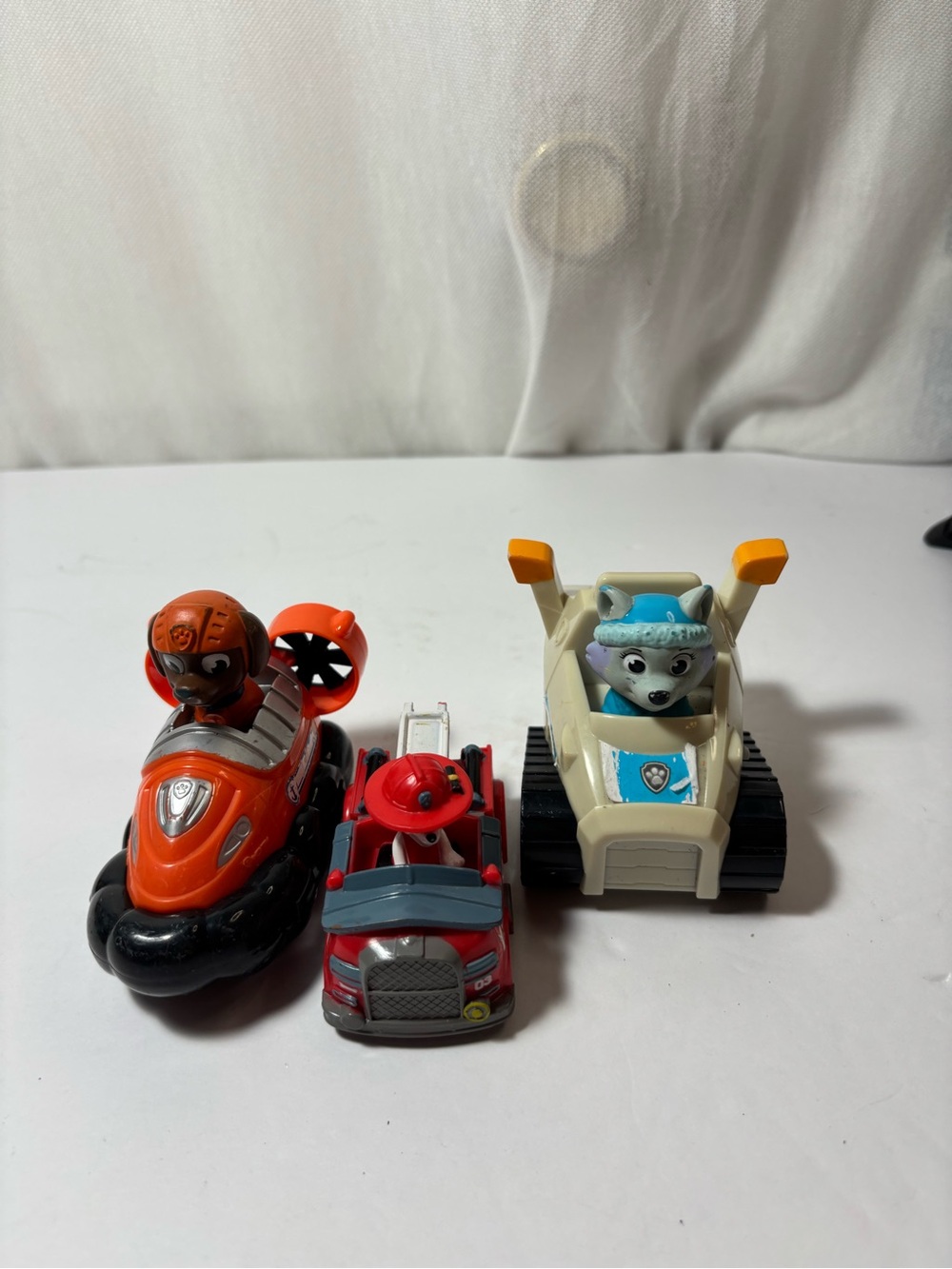 Paw Patrol Orange, Red, Black and White Vehicle Trio